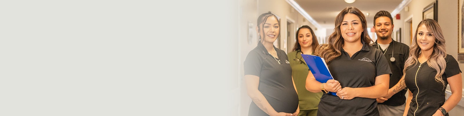 several nurses in the hallway
