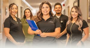 several nurses in the hallway