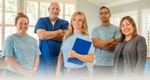 Several rehab therapists in the rehab gym