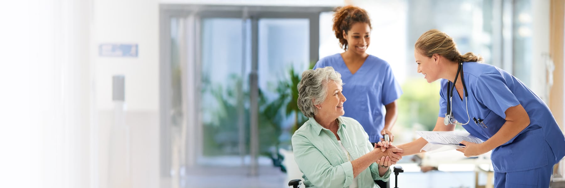 care nurses speaking with rehab resident